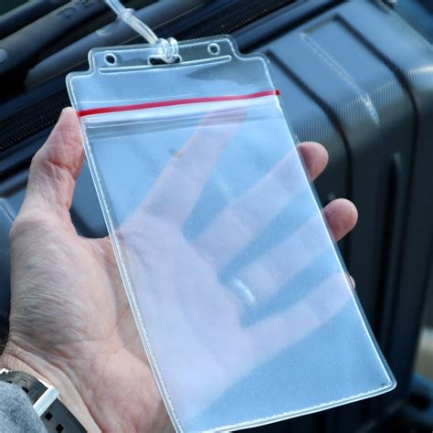 clear plastic luggage tags.